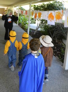 Halloween Paraders, on the march with Miss Lavenia!